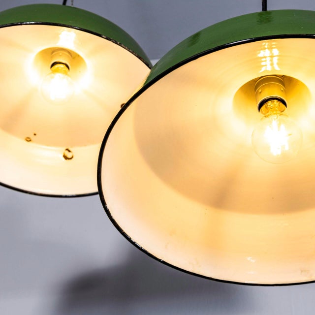 1950’s army enamel hanging pendant lamps – 16 inch. Classic industrial lamps from eastern europe, the shade is enamelled...