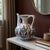 The Handmade Segmented Ewer: A Rhythm of Art Travel back in time with this Handmade Ceramic Ewer Vase. Combining the...
