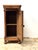 Tucked into the quiet corners of a 19th-century English home, this oak pot cupboard would have stood faithfully beside a...