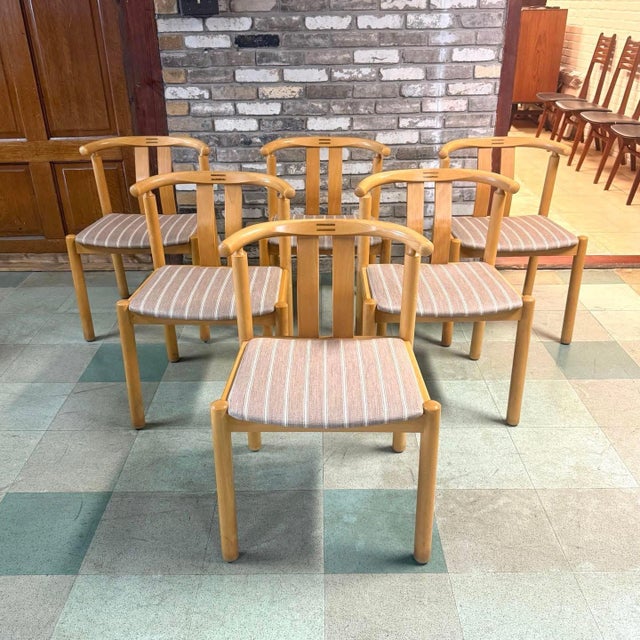 Vintage mid-century Danish modern Cleopatra dining chairs in solid beech wood by designer Hans J. Frydendal for Boltinge...