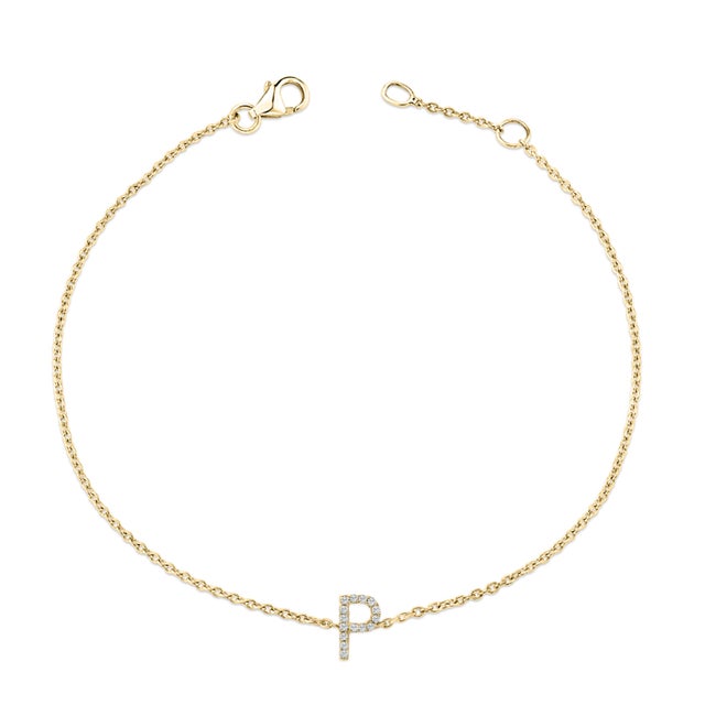 Immerse yourself in the understated elegance of this 10K yellow gold bracelet, for an enrapturing shimmer that captures...