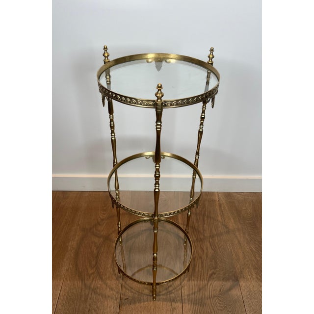 Maison Jansen 1940s Round brass pedestal table with three glass shelves. French work Attributed to Maison Jansen For Sale - Image 4 of 9