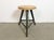 Vintage Industrial factory stool made in former Czechoslovakia during the 1960s It features a wooden seat and a green...