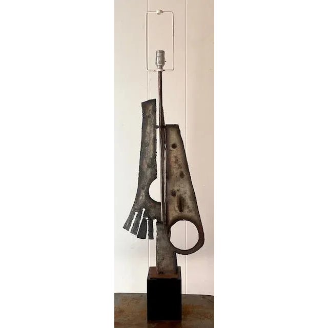 Make a bold statement with this Vintage Abstract Torch Cut Metal Lamp, a stunning piece that embodies the essence of mid-...