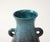 A ceramic jug with two handles in a beautiful glaze of blue and aubergine produced by Accolay Pottery. Founded in the...