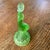 Figure of a lady made of green glass (Uranium Glass). Set out for decor or use as a flower frog in a bowl or vase. Czech...
