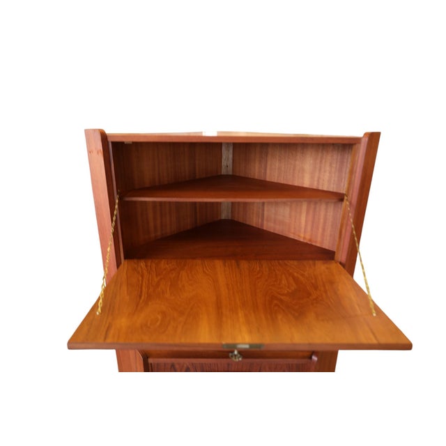 A fantastically beautiful and well-made corner cabinet, designed by gunni omann for omann jun in denmark. The cabinet is...