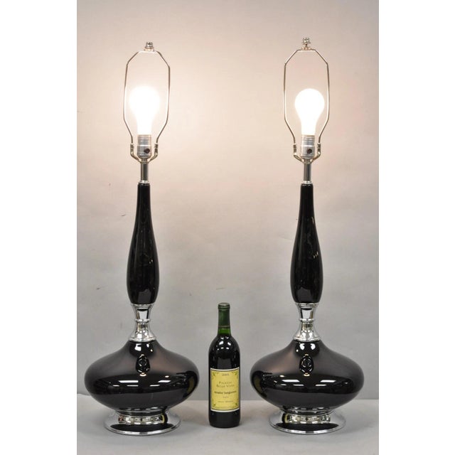 Vintage Mid Century Modern Black Glazed Ceramic & Chrome Sculpted Table Lamps - a Pair. Circa Mid 20th Century....