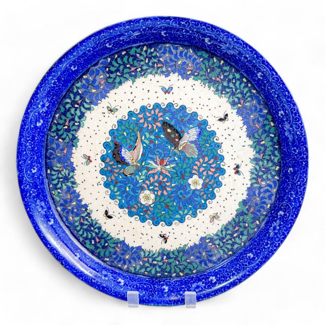 Late 19th-century Japanese porcelain dish featuring cloisonné enamel decoration in the central panel with butterflies,...