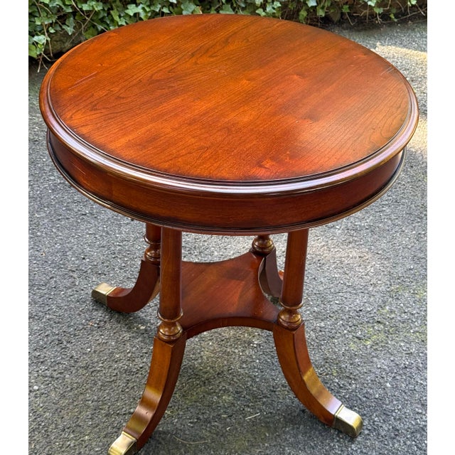 Gorgeous rustic regency end table. Features a solid cherry construction with factory distressing for antique look ,...