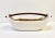 Handmade from Scandinavia, low bowl style dish with an integrated bowed wood handle. Brown glaze interior of bowl. Circa...