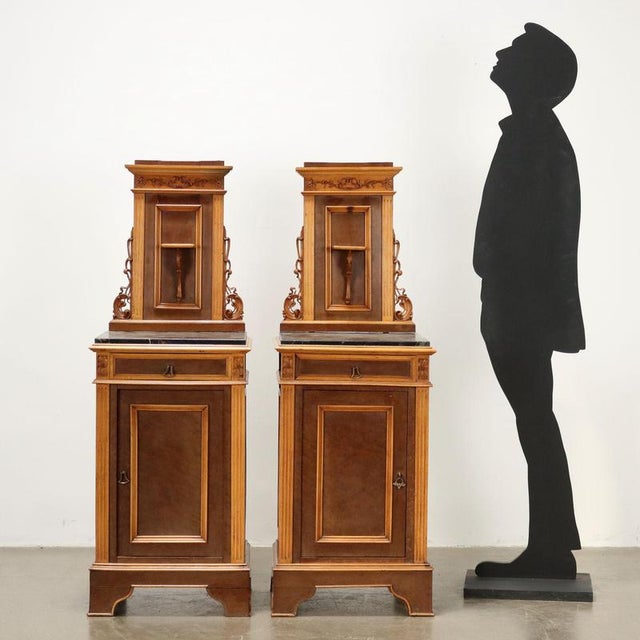 Pair of bedside tables from the Liberty period, made of cherry wood veneered in mahogany machete with maple profiles and...