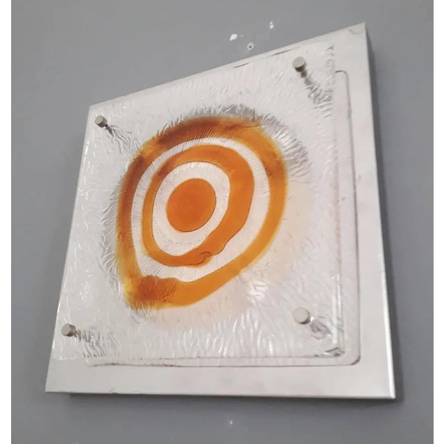 Italian vintage wall light or flushmount with a clear and amber Murano glass diffuser mounted on chrome frame / Made in...