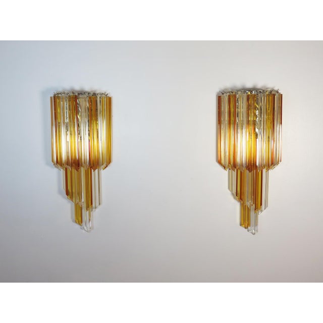 Fantastic pair of vintage Murano wall sconce made by 16 Murano crystal prism (quadriedri) for each applique in a chrome...