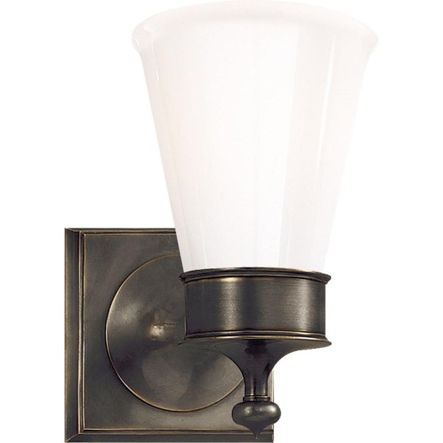 Siena Single Sconce in Bronze with White Glass Height: 8.25" Extension: 6.5" Backplate: 4.75" Square Mounting: Hardwire...