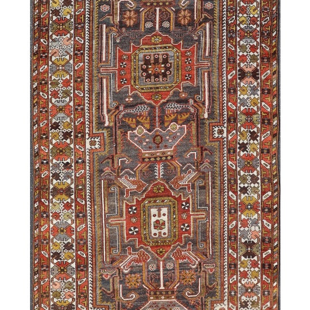Antique Persian Bakhtiar Gallery Rug Featuring a Multi-Medallion Tribal Design For Sale - Image 4 of 16