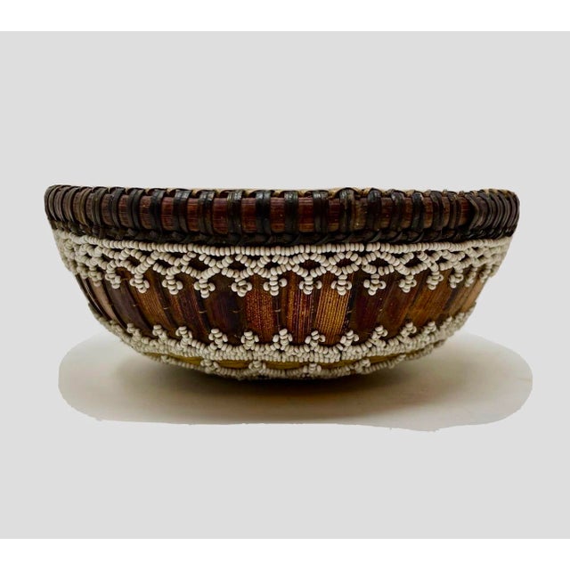 Beautiful piece of Balinese culture. This beaded offering cover is handwoven from natural materials like bamboo and palm...