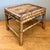 Exuding relaxed mid-century charm and organic appeal, this vintage rattan accent table brings a touch of tropical resort...