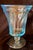 This is a collection of 14 vintage Fostoria Jamestown ice tea glasses in the iconic blue colorway and characterized by a...