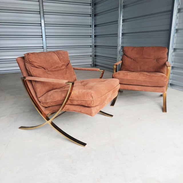 This is a fantastic pair of suade mid-century modern brass chairs. They are heavy and solid with still providing comfort...