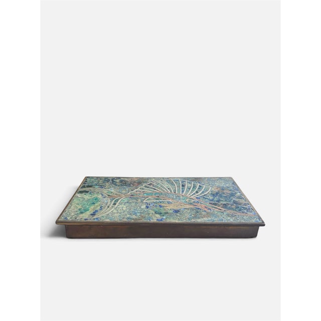 Striking midcentury decorative brass metal box featuring a stylized sailfish rendered in mixed metals over a richly...