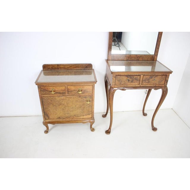 Elegant 1920s Art Deco vanity set made in Czechoslovakia, consisting of a tall wall-mounted mirror, a console vanity table...