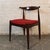 Set of six mid-century modern styled dining chairs with sculptural frames. Distinctive horn or wishbone backs that support...
