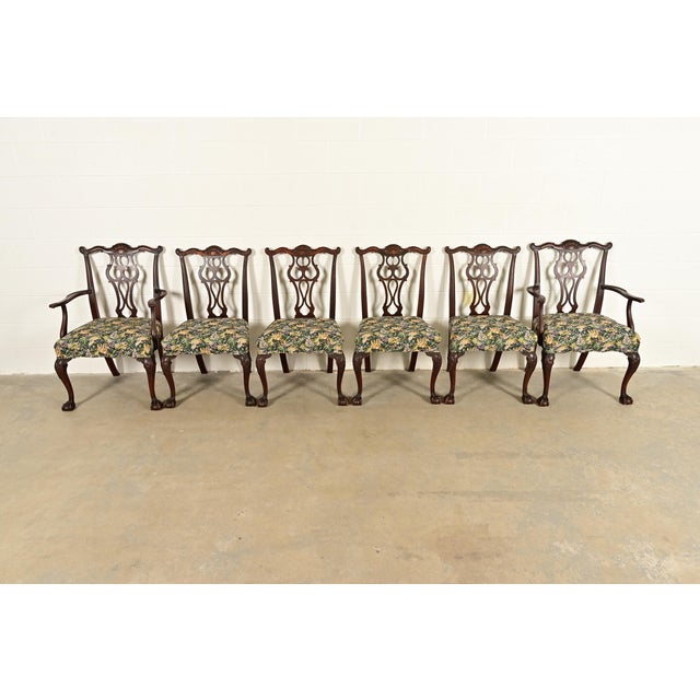 An outstanding set of six Chippendale or Georgian style dining chairs By Romweber USA, Circa 1920s Carved solid mahogany...
