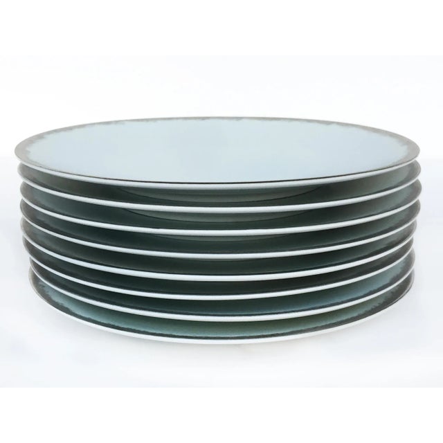 These 8 porcelain bread-&-butter plates were designed by Sophie Villepigue for Barneys New York. They were delicately...