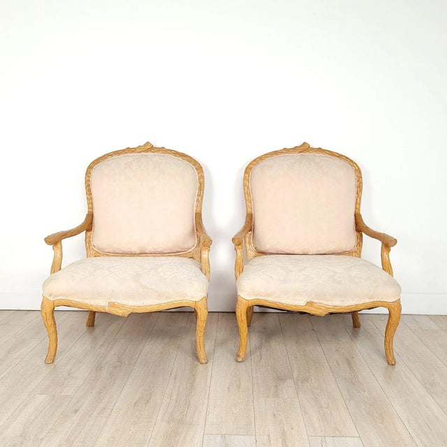 A pair of vintage oversized twig style rustic upholstered armchairs, circa 1970. Seat height 17.75".