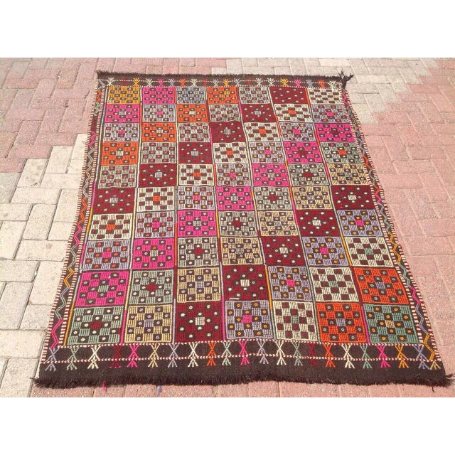 This beautiful, vintage, handwoven Kilim is approximately 60 years old. It is handmade of wool in all natural colors.. It...