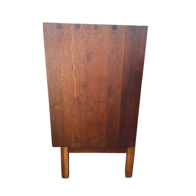 A beautifully made mid-century modern walnut credenza from Barker Bros., the storied Los Angeles furniture house...