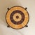 A French coffee table from the 1960s, attributed to Roger Capron, where symbolism and structure are held in careful...