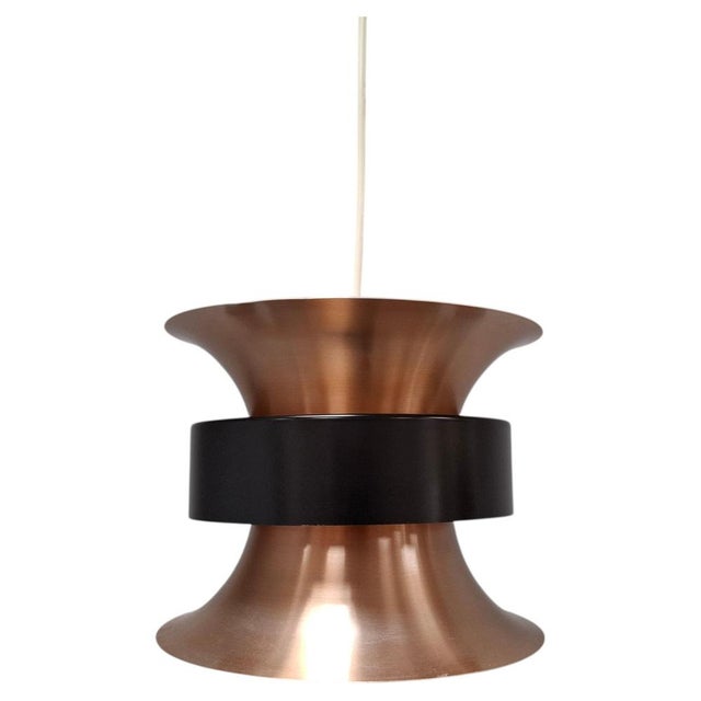 This vintage danish pendant light was designed by ben nordsted and produced by lyskaer in the 1970s. It features a refined...