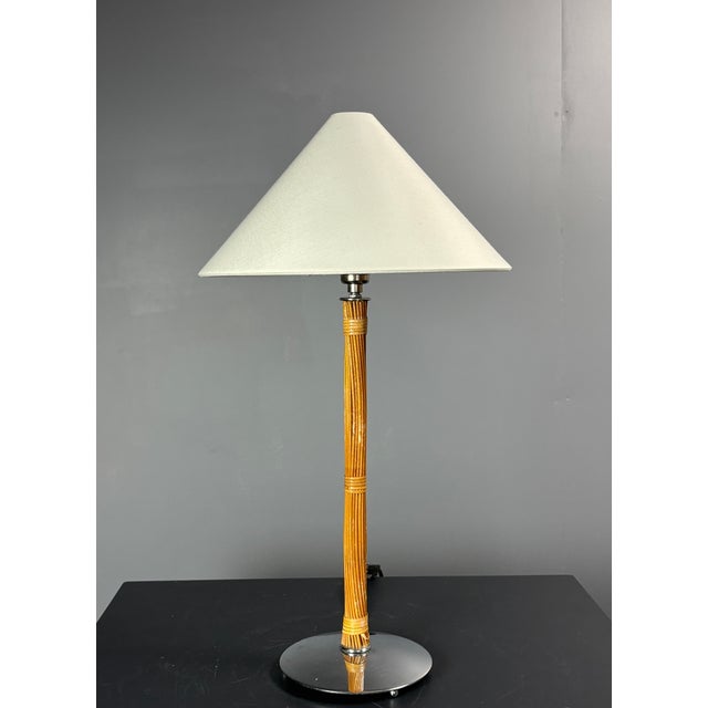 Set of two table lamps wrapped in pencil reed rattan with chrome base and new nickel fitting ( E27 lightbulb ). Both lamps...