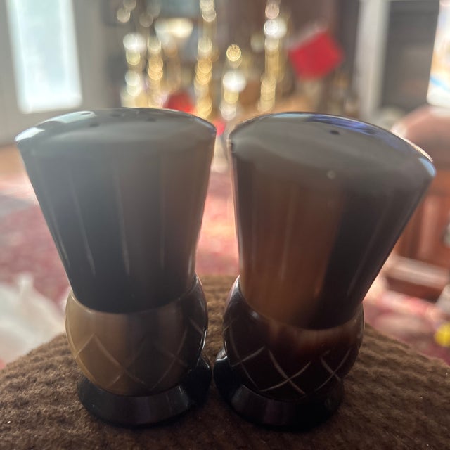 These are vintage Scottish thistle-shaped salt and pepper shakers typically made from hand-carved stag horn.They often...