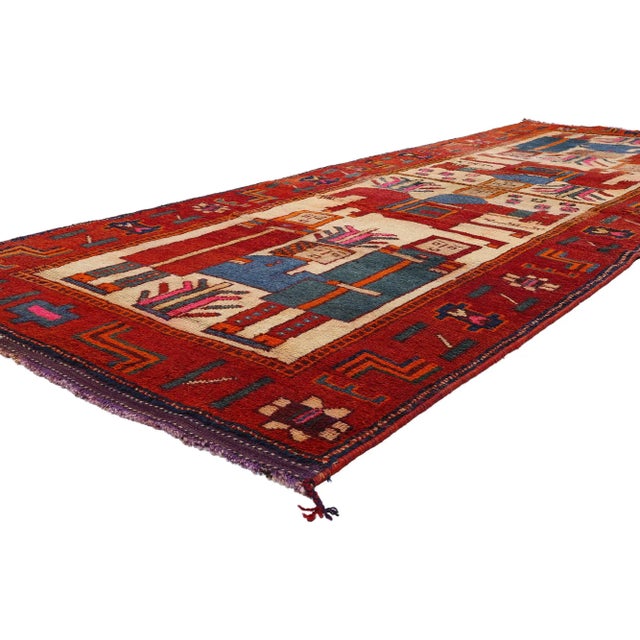 53909 Vintage Kurdish Pictorial Rug, 04'04 x 11'05. This hand-knotted wool vintage Kurdish rug portrays the tragic love...