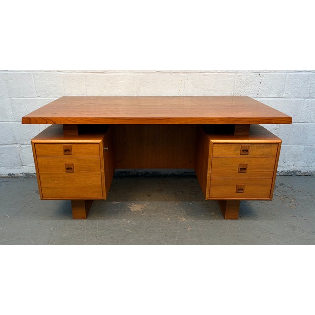 Elevate your workspace with this Mobican Mid-Century Teak Desk, expertly crafted in Canada and showcasing the timeless...