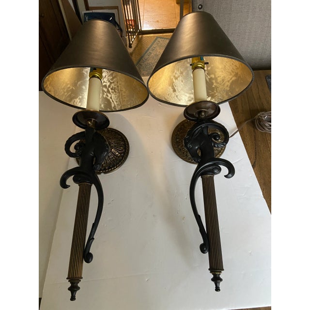 French Sergio Bustamante style Gazelle Ram wall sconces Done in Black and Gold With clip on lightbulb lamp shades With...