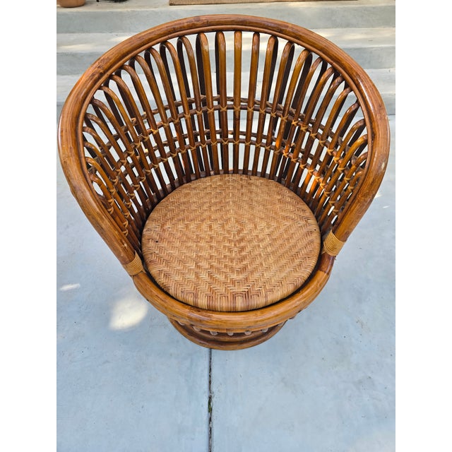 ▪️Mid-Century Modern Swivel Chair ▪️Attributed to Franco Albini ( No makers mark found) ▪️Beautiful bent ratan frame with...