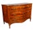 A good clean chest with a serpentine top with banded edge over three conforming drawers with brass handles and...