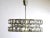 Prestigious chandelier by Bakalowits. 3 rows of large (7 cm diameter) hand-cut glass elements. 4 E27 sockets. Very high-...