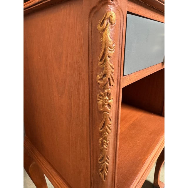 Add a touch of curated Parisian elegance to your space with this professionally refinished mid-century Louis XV revival...