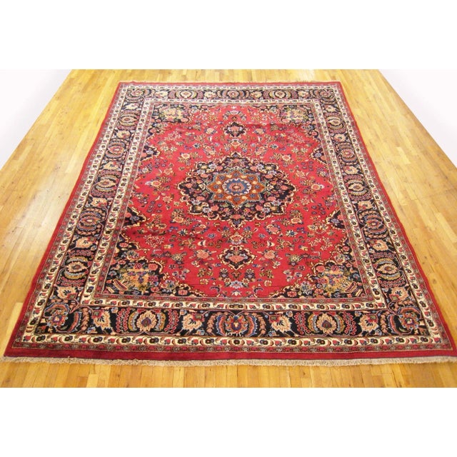 Vintage Persian Meshed Oriental rug, Room size A vintage Persian Meshed oriental rug, size 11'7" x 8'7", circa 1950. This...