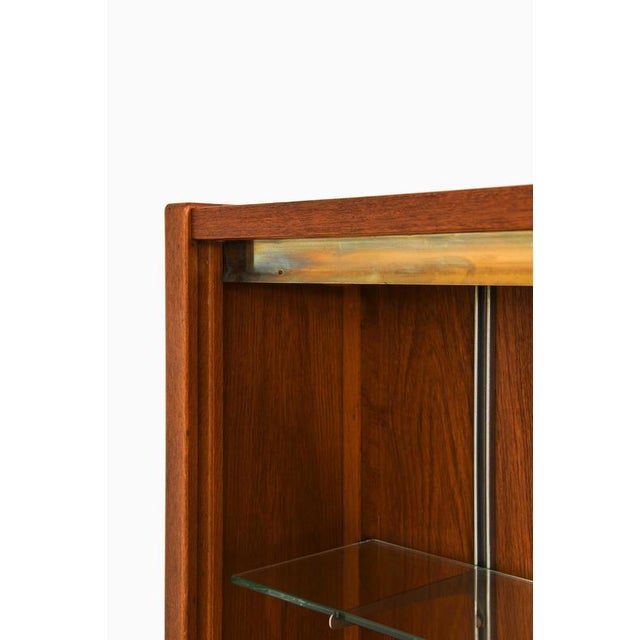 Wood Scandinavian Modern Cabinet in Glass, Teak and Beech attributed to Carl-Axel Acking, 1950s For Sale - Image 7 of 10
