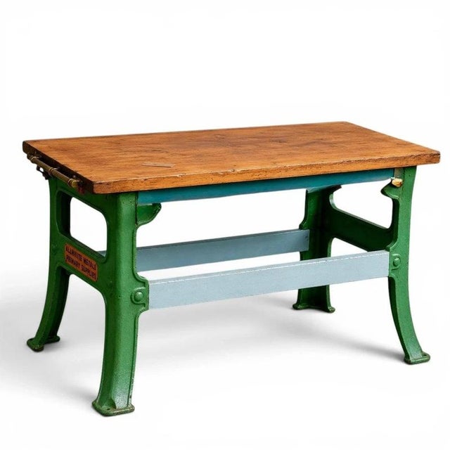 A characterful vintage butcher’s block combining a thick solid hardwood work surface with a substantial cast-iron base. An...