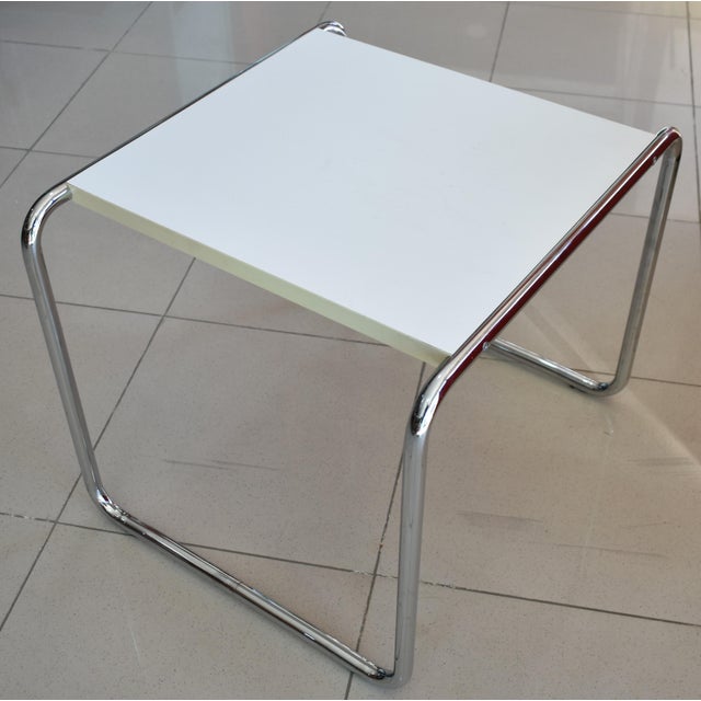 Vintage Italian side table, Laccio model by Marcel Breuer, Bauhaus style. This side table features modernist lines and is...