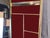 This exquisite Cartier red Murano glass mirror, made in Italy, embodies modern elegance with its Murano glass panels...