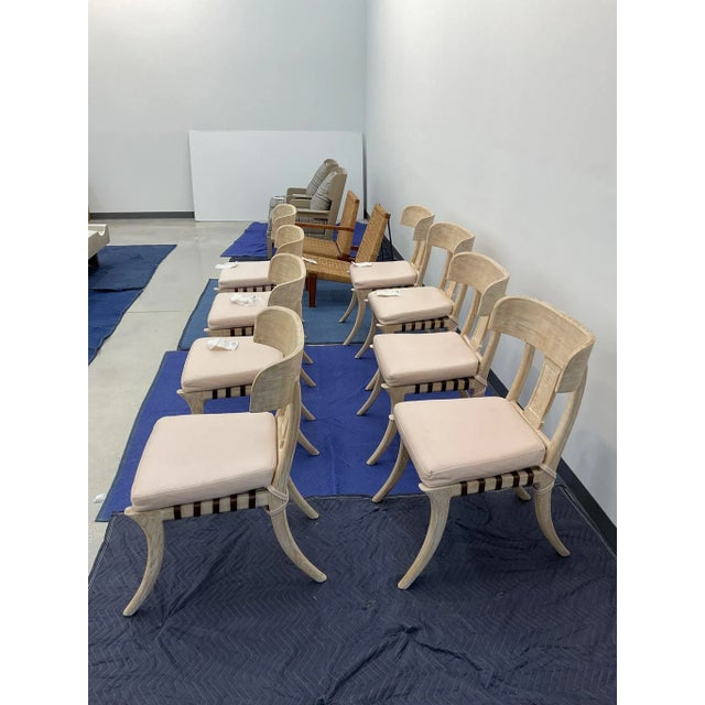 8 Klismos dining chairs with saber legs, Dark Brown Woven leather seats with cushions. Klismos chairs are oak wood chairs...