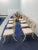8 Klismos dining chairs with saber legs, Dark Brown Woven leather seats with cushions. Klismos chairs are oak wood chairs...